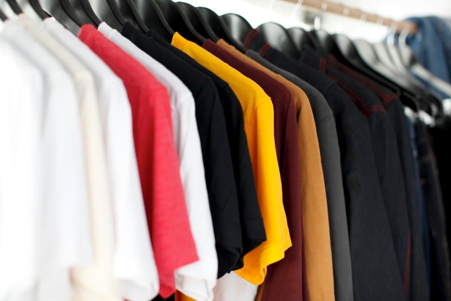 Clothing on hangers in a fashion shop